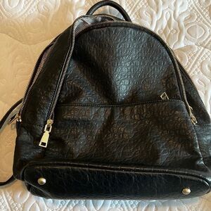Adorable faux leather backpack with lots of pockets black and gold